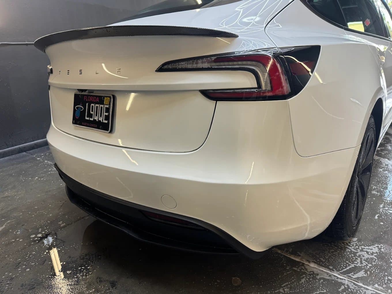 Rear-panel detail on a finished Tesla